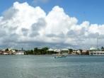 The panoramic view of boats arriving to Belize City (Belize).