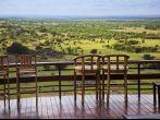 Savannah landscape in  Serengeti Tanzania, Africa. Chairs on the terrace for observation