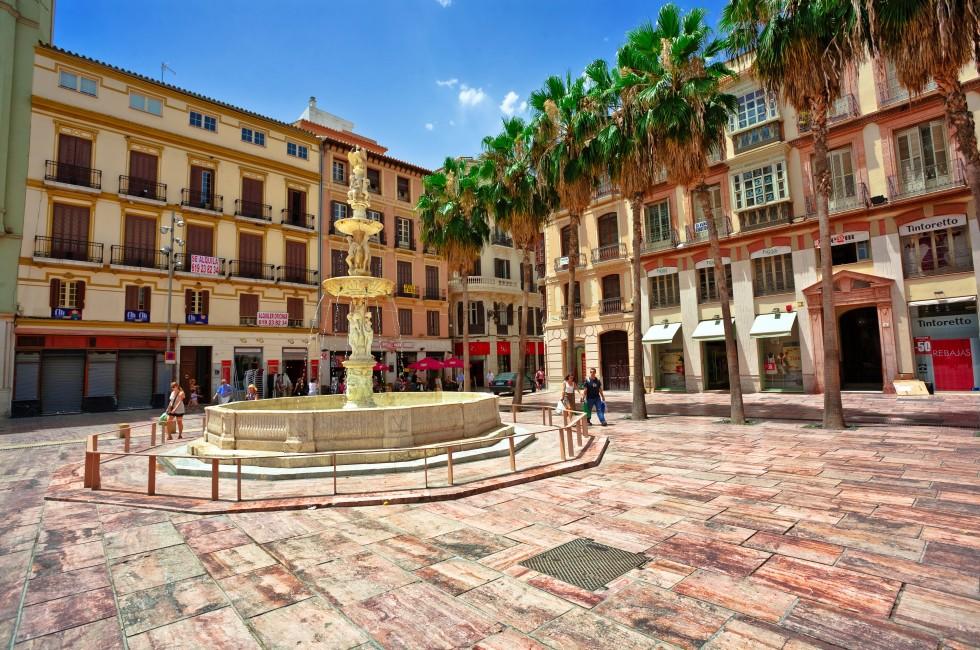 MALAGA, SPAIN - JULY 8:Tourists walk around the historic center of Malaga on July 8, 2010 The administrative center in Andalusia of the province of Malaga, Spain, the population is 561,250 people (2007).