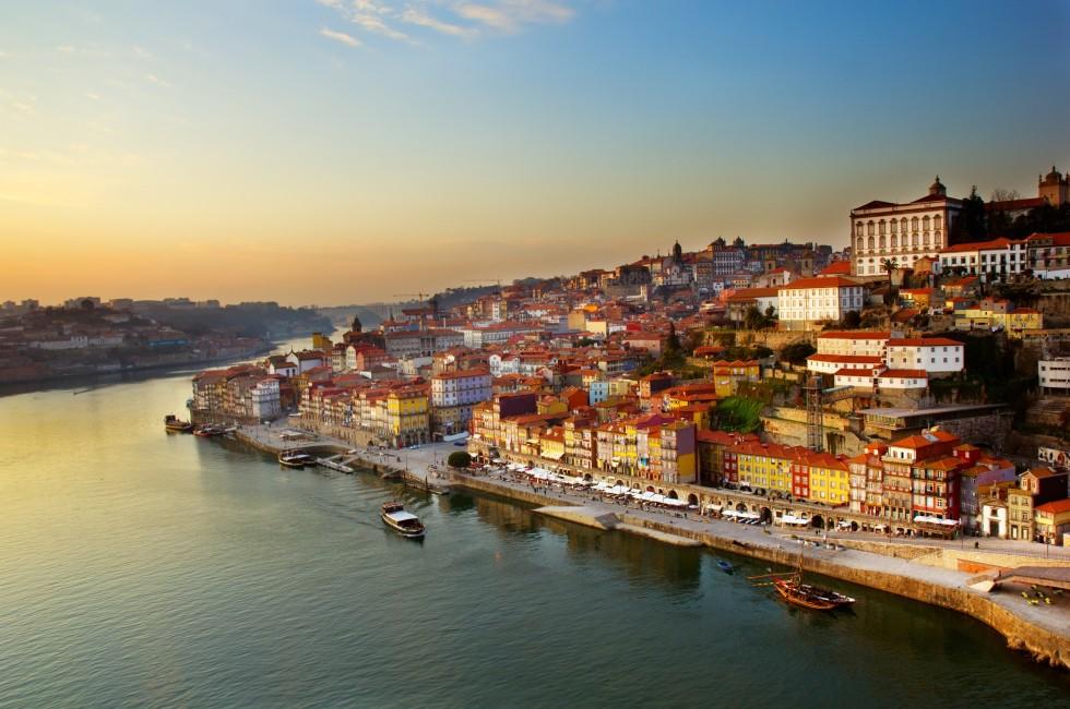 hill with old town of  Porto and river Douro at sunset, Portugal; 