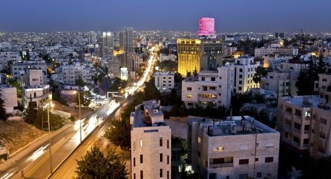 Amman,Jordan - April 29 : City lights after the sunset on April 29,2013 in the west side of the capital &quot;Amman&quot; and Le Royal hotel with in the background.